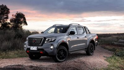 New Nissan Navara on remote ridge in front of distant sunset