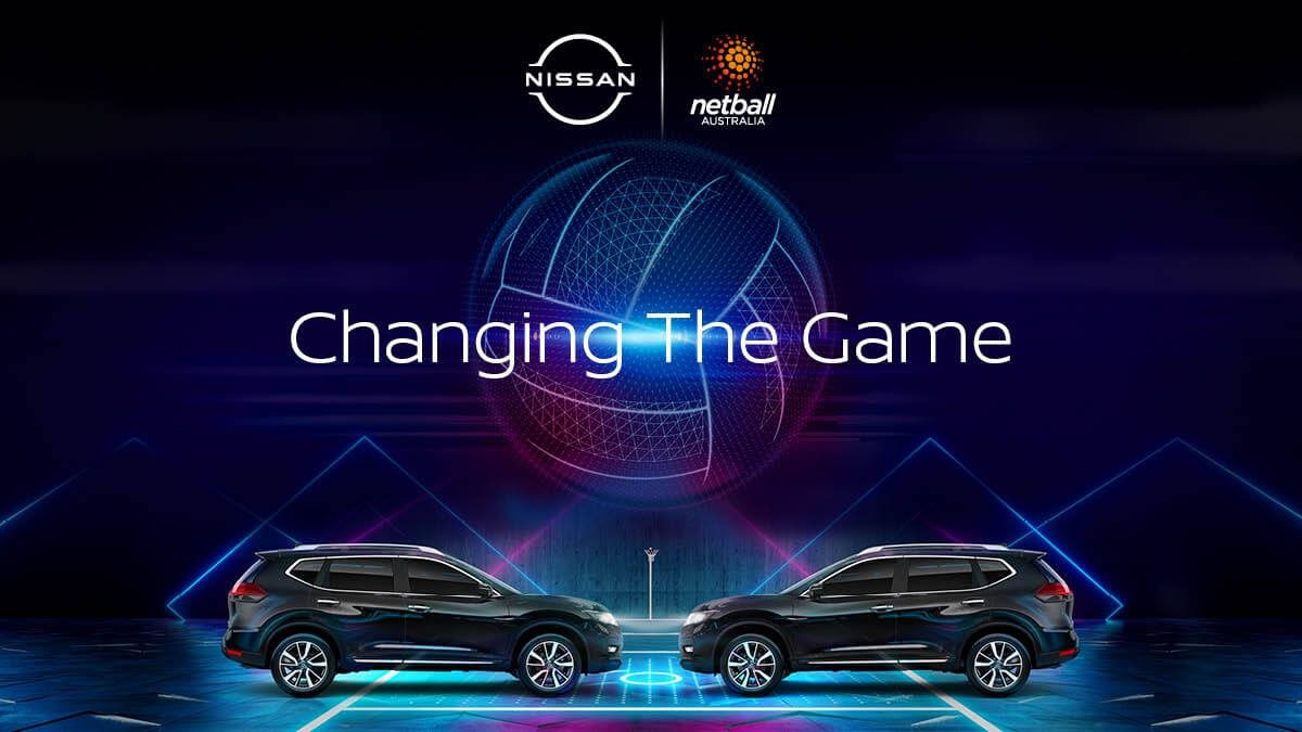 'Changing the game; Netball Australia, Nissan Official Auto Partner' - Stylised netball over two Nissan X-TRAIL's