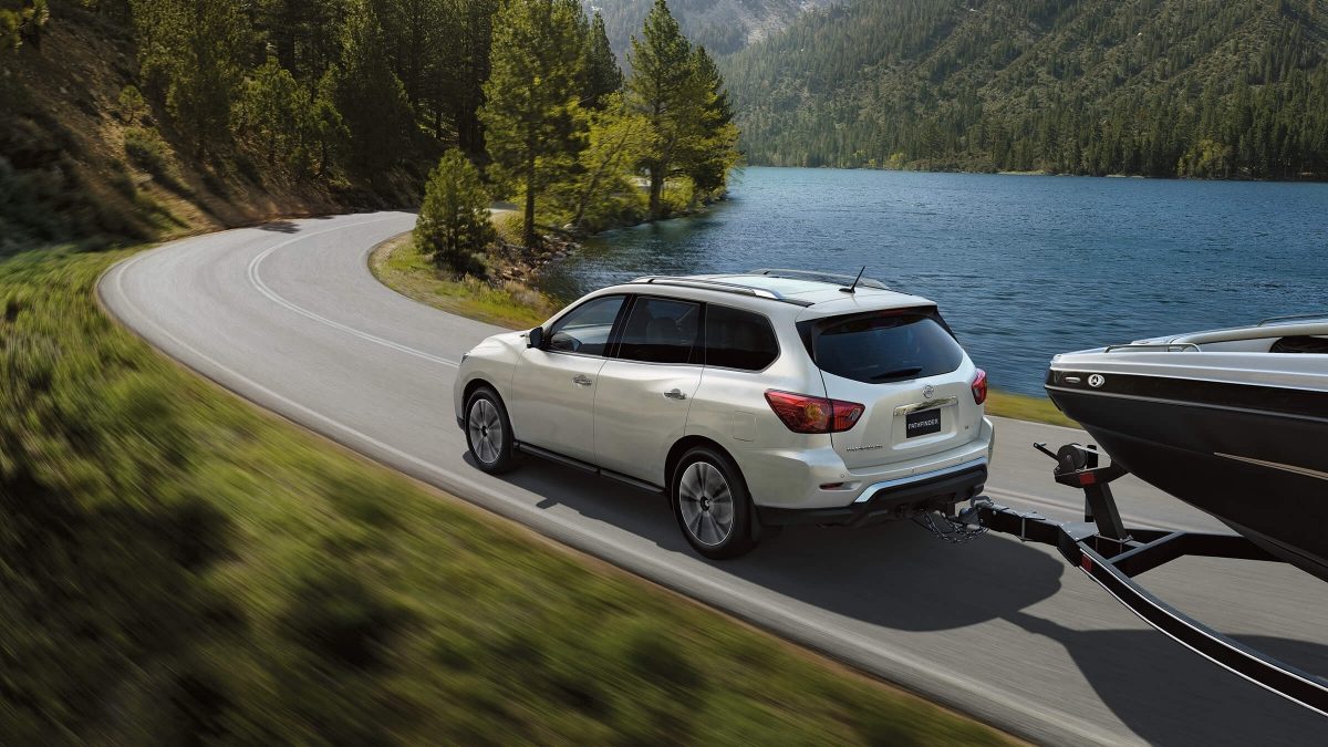 Nissan Pathfinder towing boat