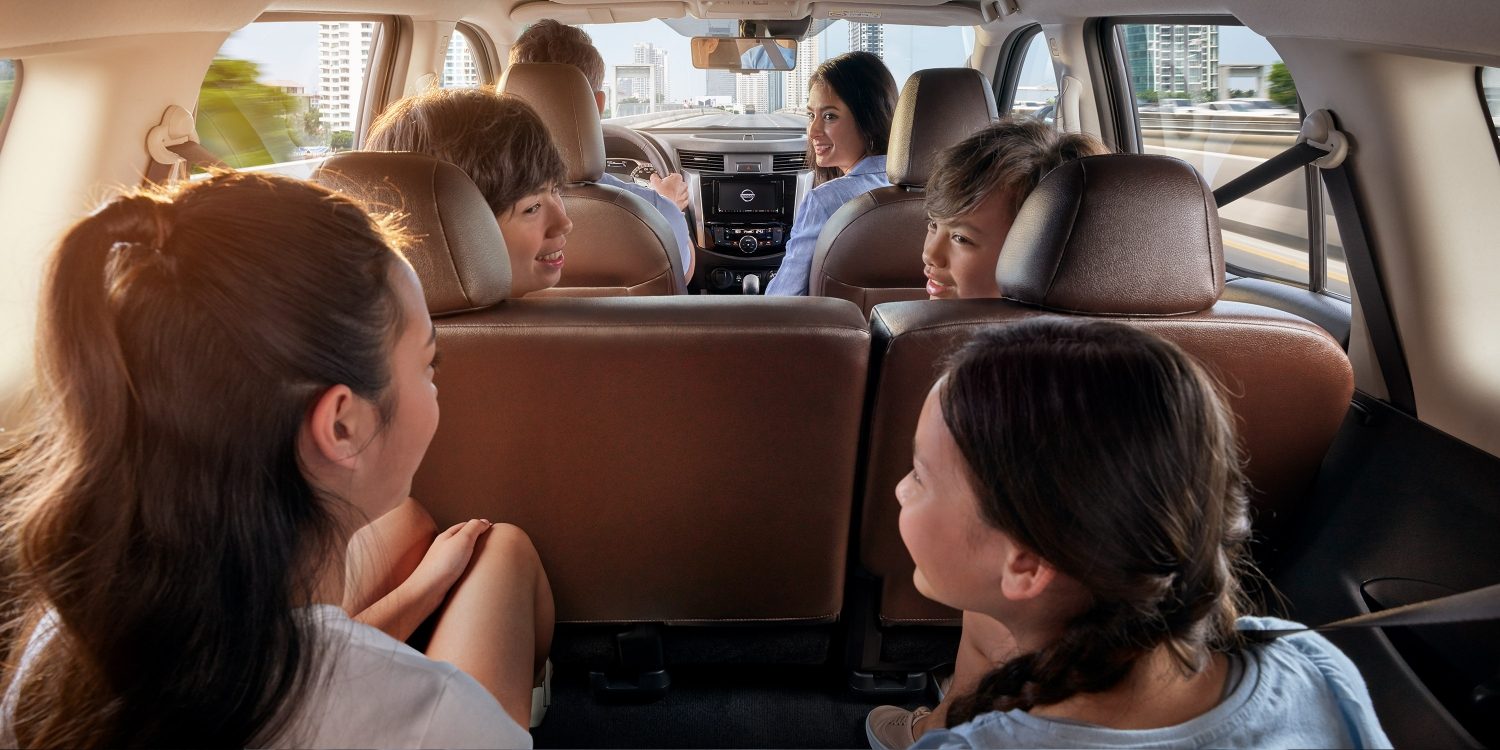 Nissan Terra interior with people in all three rows