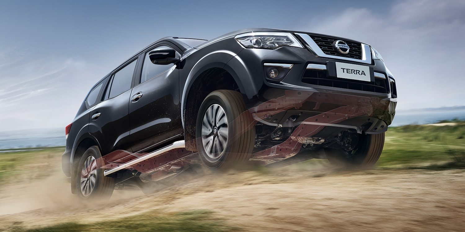 Nissan Terra driving up a rough dirt road