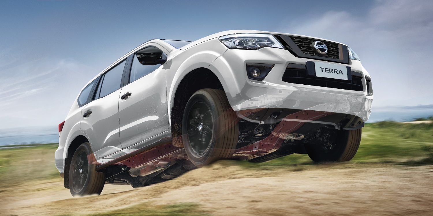 Nissan Terra driving up a rough dirt road