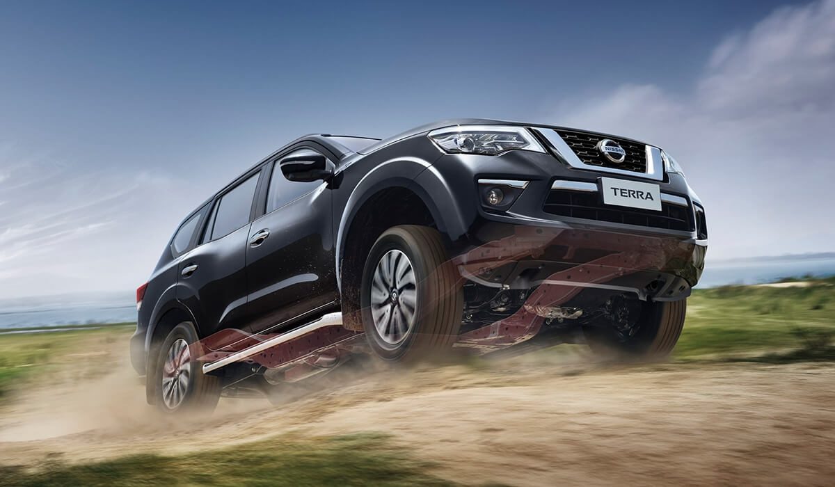 Nissan Terra driving up a rough dirt road