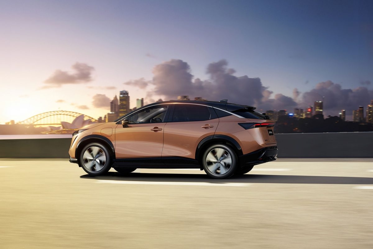 Nissan ARIYA side view overlooking a city