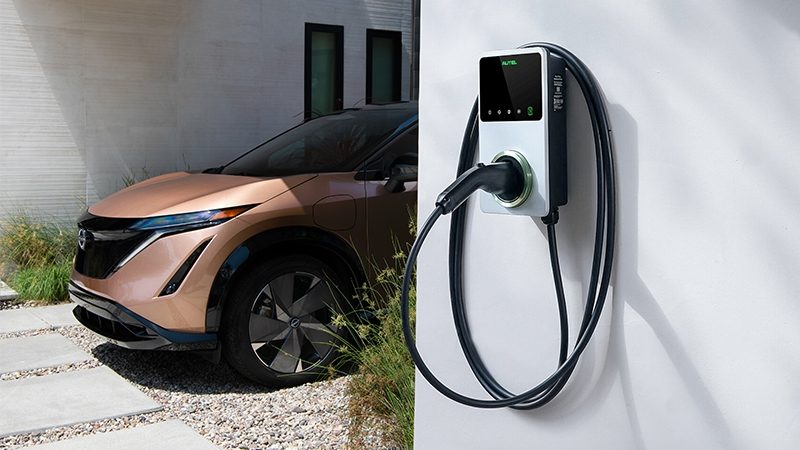 Electric Nissan Ariya charging at home during the day
