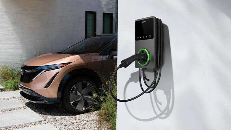 Nissan ARIYA charging at home in carport