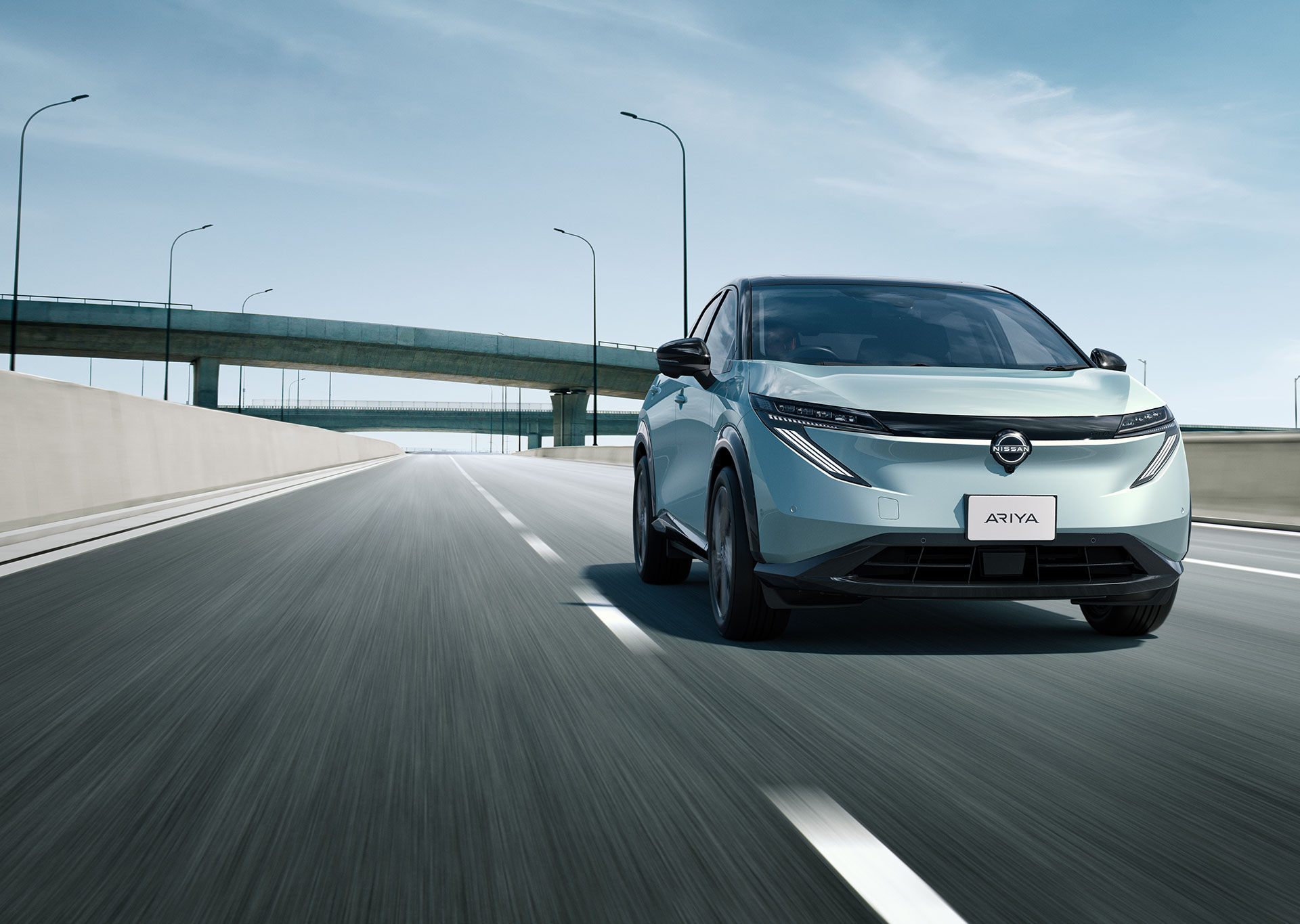 Nissan ARIYA front view on the highway